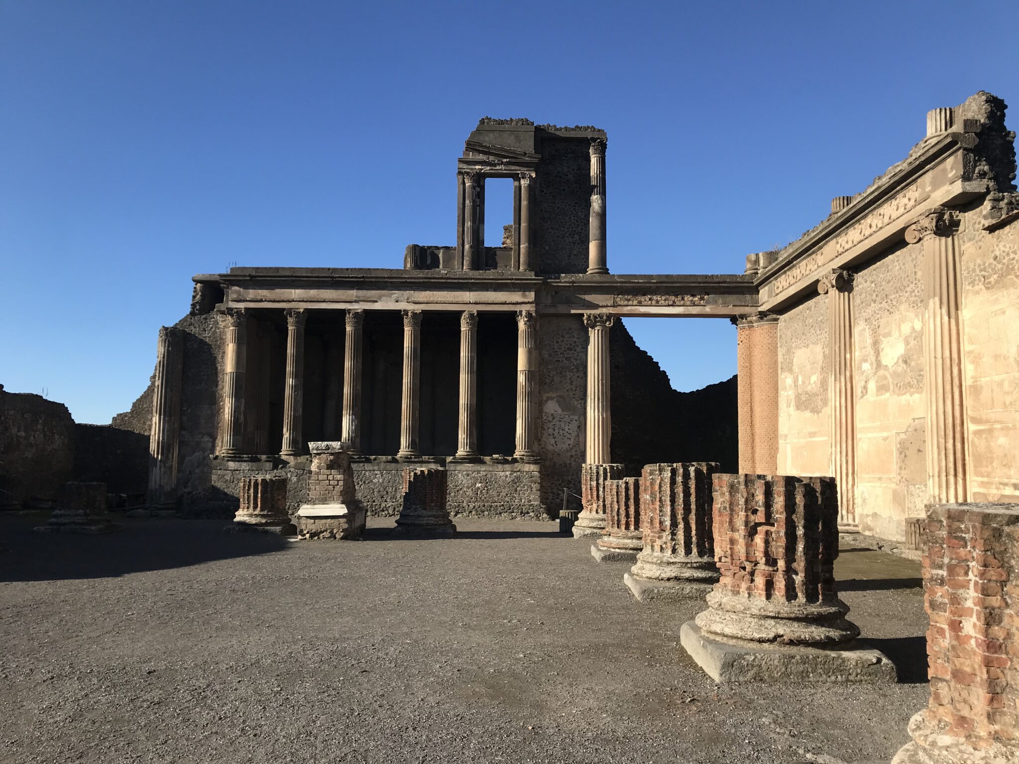 Pompeii columns in an open courtyard