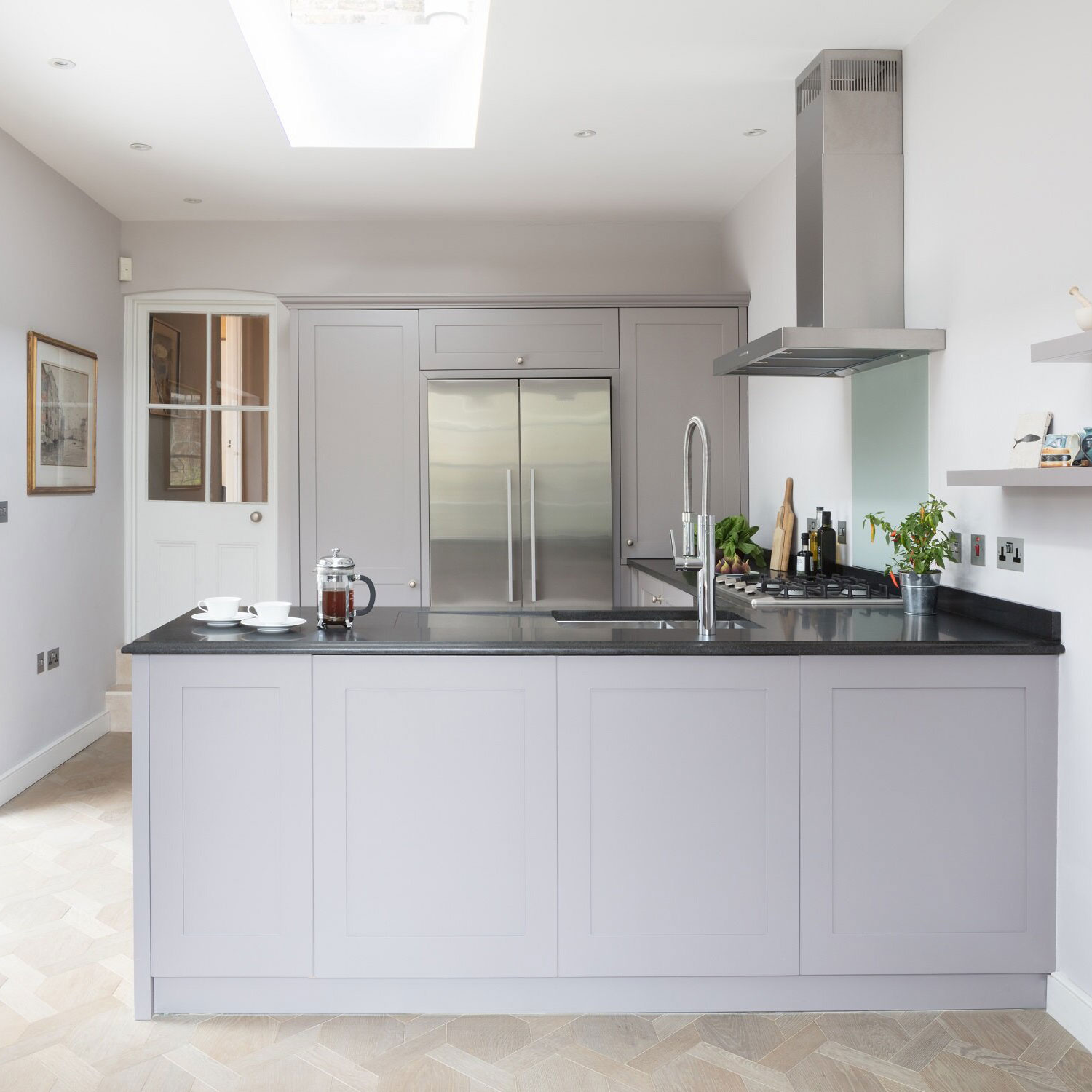 Bespoke cabinetry transforms a compact apartment kitchen - Contemporary Apartment Renovation With Bespoke Cabinetry